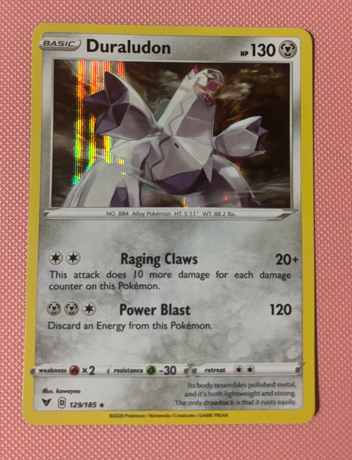 Duraludon – 129/185
(Reverse Holo Rare) English Vivid Voltage
Condition: Near Mint